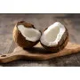 Фотошпалери дві половинки кокоса на дерев'яній дошці